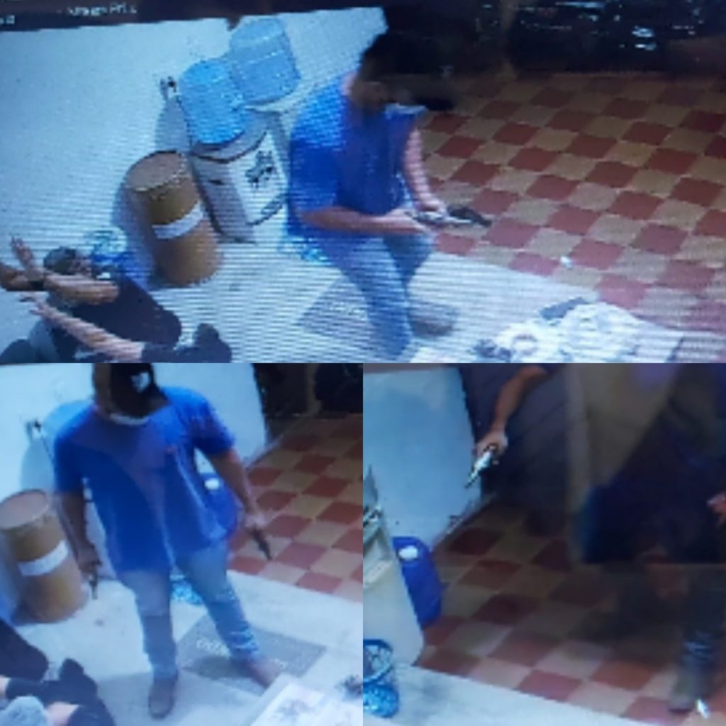 (Imagens: Ladrão com uma das armas usadas no roubo ao Armazém de Bola)
